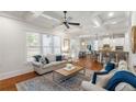 Bright living room with coffered ceilings, hardwood floors, and an open floor plan at 1861 8Th St, Atlanta, GA 30341