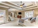 Spacious main bedroom suite with tray ceilings, and access to private balcony at 1861 8Th St, Atlanta, GA 30341