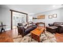 Inviting living room with hardwood floors and cozy rustic decor at 24 Scarlett Oak Ne Dr, Cartersville, GA 30121