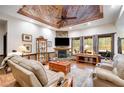 Spacious living area features a stone fireplace and natural light at 575 W Wayside Rd, Carrollton, GA 30116