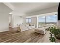 Open-concept living and dining area with large windows offering panoramic views at 270 17Th Nw St # 3604, Atlanta, GA 30363