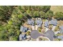 Aerial view of neighborhood homes with well-maintained lawns and mature trees in a quiet cul-de-sac at 116 Edgeview Ct, Dallas, GA 30157