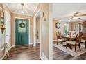 Open entryway featuring wood-look floors, dining area, and stylish decor elements at 1522 Sprayberry Dr, Marietta, GA 30066