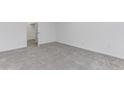 Bright, carpeted bedroom with walk-in closet showing neutral walls and flooring at 1150 Collier Nw Rd # F11, Atlanta, GA 30318