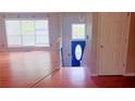 Inviting entryway featuring wood floors, plenty of light and a split-level entry at 4443 Whitt Mill Nw Rd, Acworth, GA 30101