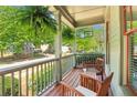 Cozy front porch featuring wooden rocking chairs and hanging plants, perfect for relaxing outdoors at 2124 Marshalls Se Ln, Atlanta, GA 30316