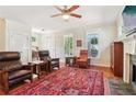 Comfortable living room showcasing hardwood floors, a decorative rug, and ample seating at 2124 Marshalls Se Ln, Atlanta, GA 30316