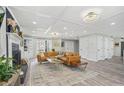 Bright living room boasts a cozy fireplace, stylish furnishings, and an open layout perfect for entertaining at 750 Southland Pass, Stone Mountain, GA 30087