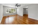 Inviting living room boasting hardwood floors, natural light and access to other rooms at 2461 Antwerp Se Dr, Atlanta, GA 30315