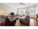 Bright living room with hardwood floors, natural light, and comfortable seating, creating a cozy ambiance at 1647 Sabastian Ne Pt, Atlanta, GA 30329