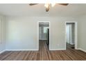 Open floor plan featuring hardwood floors and neutral paint, creating a bright and inviting living space at 2240 Polar Rock Sw Ave, Atlanta, GA 30315