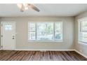Bright living room with hardwood floors, modern ceiling fan, and windows to let in natural light at 2240 Polar Rock Sw Ave, Atlanta, GA 30315