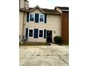Charming two-story home with blue shutters and inviting front walkway at 912 Holden Ln, Atlanta, GA 30349