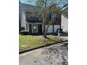 Inviting two-story house with a two-car garage and lush green lawn at 3131 Leyland Ct, Decatur, GA 30034