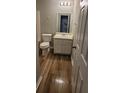 Cozy bathroom with stylish vanity, mirror, lighting, and well-maintained fixtures at 930 Parkway Rd, Union City, GA 30291
