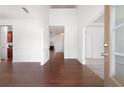 Bright foyer featuring hardwood floors and classic wainscoting at 416 Blue Sky Cir, Acworth, GA 30102