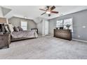 Bright bedroom with vaulted ceiling, neutral carpet and a ceiling fan at 2311 October Nw Ct, Acworth, GA 30102