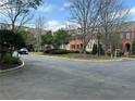 Street view of well-maintained townhomes in The Gates at Parkside Village at 611 Parkside Village Nw Way, Marietta, GA 30060