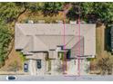 Aerial view of the townhome, showing its layout and proximity to surrounding greenery and parking at 168 Ellis Dr, Conyers, GA 30012