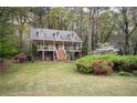 Beautiful two-story home featuring a classic design and well-maintained lawn at 2962 Moorings Pkwy, Snellville, GA 30039