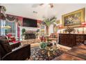 Inviting living room with a stone fireplace, decorative accents, and a comfortable seating area at 1935 Knight Cir, Loganville, GA 30052