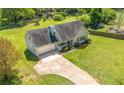 A charming single-Gathering home with lush front yard and a two-car garage at 362 Mcgiboney Rd, Covington, GA 30016