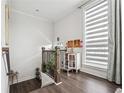 Bright foyer with a staircase and large window with modern shade at 245 Fairview Cir, Roswell, GA 30076