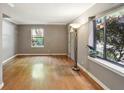 Bright living room featuring hardwood floors, large windows, and neutral color at 702 Argonne Ne Ave # 1, Atlanta, GA 30308