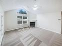 Spacious living room with a fireplace, large window, and vaulted ceiling at 2252 Carefree Cir # 3, Marietta, GA 30062