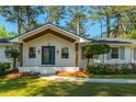 Inviting front porch showing stone walkway and blue front door at 3365 Ardley Sw Rd, Atlanta, GA 30311
