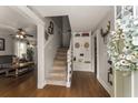 Inviting foyer with hardwood floors, staircase, and decorative accents creating a warm welcome at 503 Duke Dr, Marietta, GA 30066