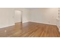 Bright living room featuring hardwood floors, neutral walls and ample space at 770 Raleigh Sw Ct, Marietta, GA 30064