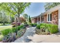 Inviting walkway leading to the front entrance, surrounded by lush landscaping at 1802 N Akin Ne Dr, Atlanta, GA 30345