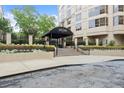 Attractive entrance to The Oaks Buckhead featuring manicured landscaping and elegant architecture at 3475 Oak Valley Road Ne # 870, Atlanta, GA 30326