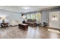 Inviting living room with lots of natural light, perfect for entertaining or relaxing at 537 Craven Rd, Roopville, GA 30170