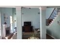 Spacious living room with fireplace, high ceilings, and modern decor at 4118 Sandy Branch Dr, Buford, GA 30519