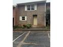 Charming two-story townhome with a brick facade and private entrance at 4485 Golf Vista Cir, Decatur, GA 30035