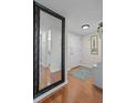 Inviting foyer with hardwood floors, a large decorative mirror, and ample natural light at 3689 Essex Ave # 16, Atlanta, GA 30339