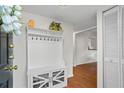 Bright mudroom with built-in storage and hooks for organizing outerwear and bags at 3689 Essex Ave # 16, Atlanta, GA 30339