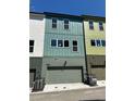Rear exterior showing a two-car garage with modern finishes at 1392 Cozy Circle # 349, Atlanta, GA 30315