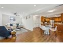 Open-concept living room seamlessly flows into a modern kitchen and dining area at 2202 Green Forrest Dr, Decatur, GA 30032