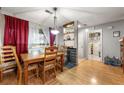 Inviting dining area with hardwood floors, natural light, and open access to other living spaces at 2172 Oakland Ridge Dr, Lawrenceville, GA 30044