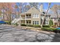 Inviting condo featuring a traditional design, tidy landscaping, and a tranquil neighborhood setting at 208 Bainbridge Dr, Atlanta, GA 30327