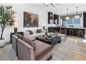 Inviting living room showcasing modern decor, comfortable seating, and an open layout connected to the kitchen at 946 Hughley Circle # 98, Atlanta, GA 30316