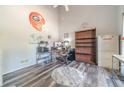 Spacious bedroom with wood floors, a ceiling fan, and plenty of room for a desk at 1356 Belfaire Trce, Dacula, GA 30019