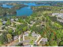 Breathtaking aerial view showcasing the property's prime location near a serene lake at 1420 Lockridge Dr, Cumming, GA 30041
