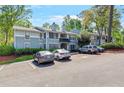 Apartment building with convenient parking and well-maintained exterior, nestled in a lush, green environment at 305 Summit North Ne Dr # 305, Atlanta, GA 30324