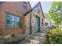 Close-up of a house entrance featuring brickwork and a stone facade at 1884 Montrose Dr, East Point, GA 30344