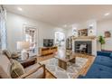 Bright living room with hardwood floors, fireplace, and neutral decor at 1884 Montrose Dr, East Point, GA 30344