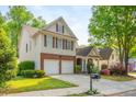 A lovely home with a well-kept lawn, lush greenery, and a charming mailbox at 2810 Stillwater Park Dr, Marietta, GA 30066